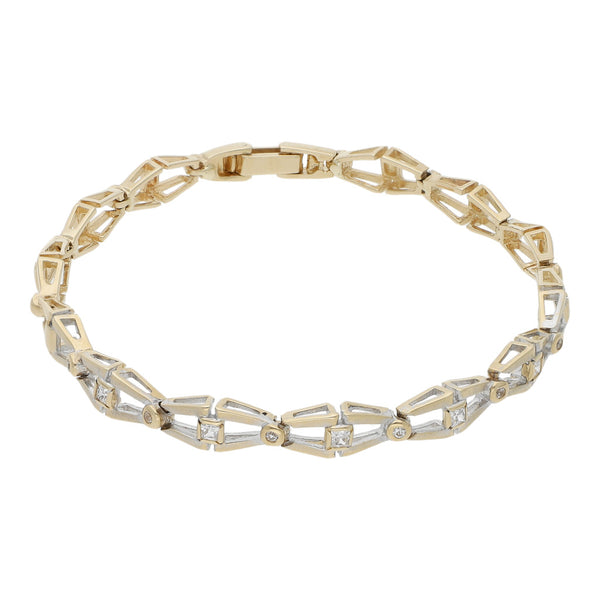 Pulsera eslabón articulado con circonias en oro dos tonos 14 kilates.