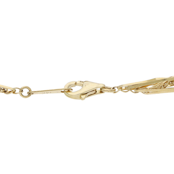 Pulsera eslabón tejido en oro amarillo 14 kilates.