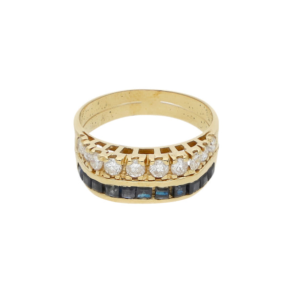 Anillo diseño especial con diamantes y zafiros en oro amarillo 18 kilates.