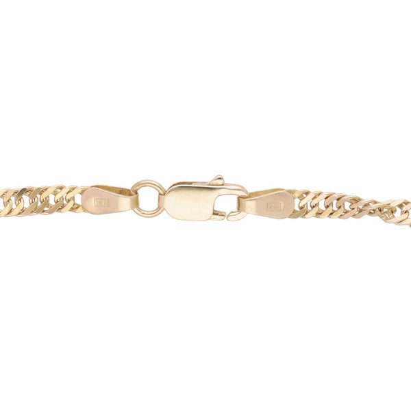 Pulsera eslabón combinado con colgantes motivo delfín en oro amarillo 14 kilates.