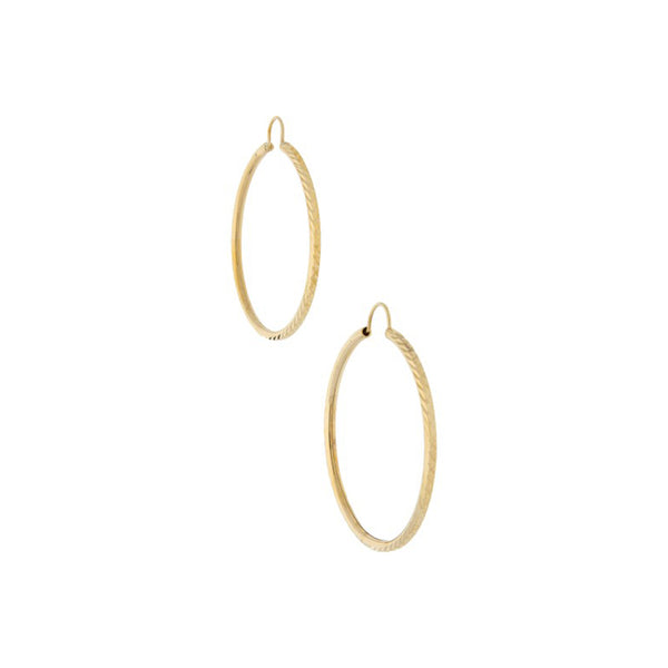 Arracadas facetadas en oro amarillo 14 kilates.