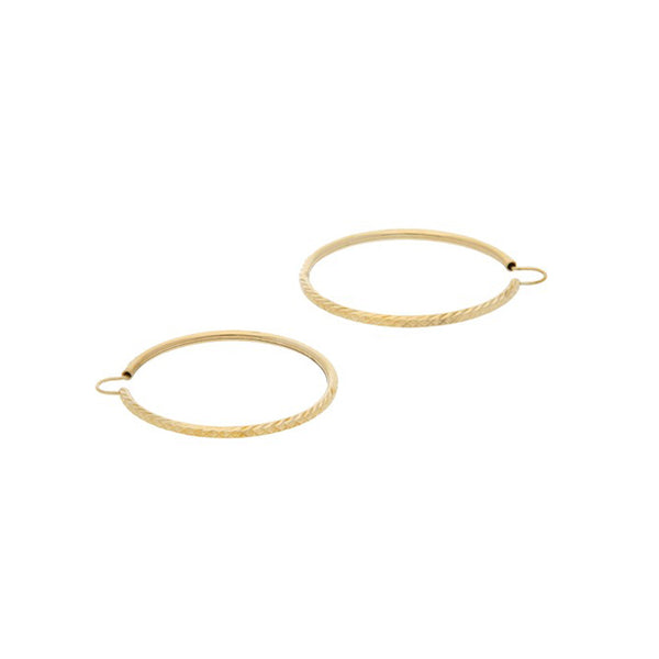 Arracadas facetadas en oro amarillo 14 kilates.