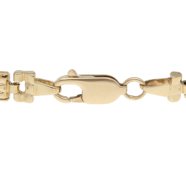 Pulsera eslabón articulado en oro tres tonos 14 kilates.