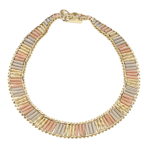 Pulsera eslabón boleado en oro tres tonos 14 kilates.