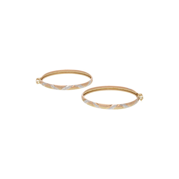 Arracadas labradas en oro amarillo 14 kilates.