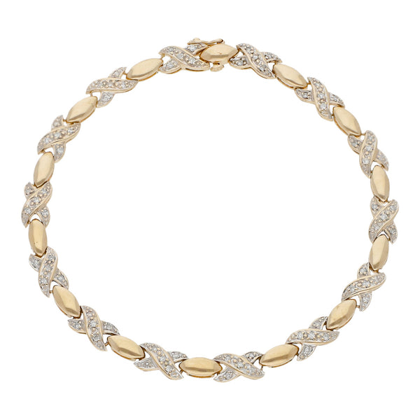 Pulsera eslabón articulado con diamantes en oro amarillo 14 kilates.