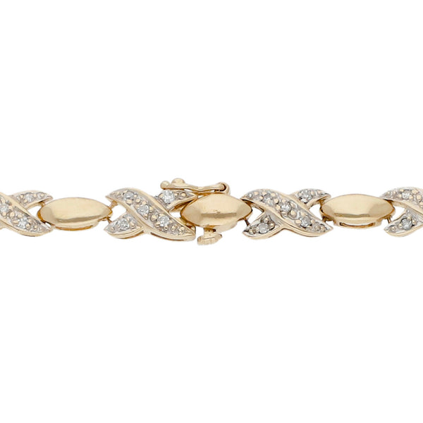 Pulsera eslabón articulado con diamantes en oro amarillo 14 kilates.