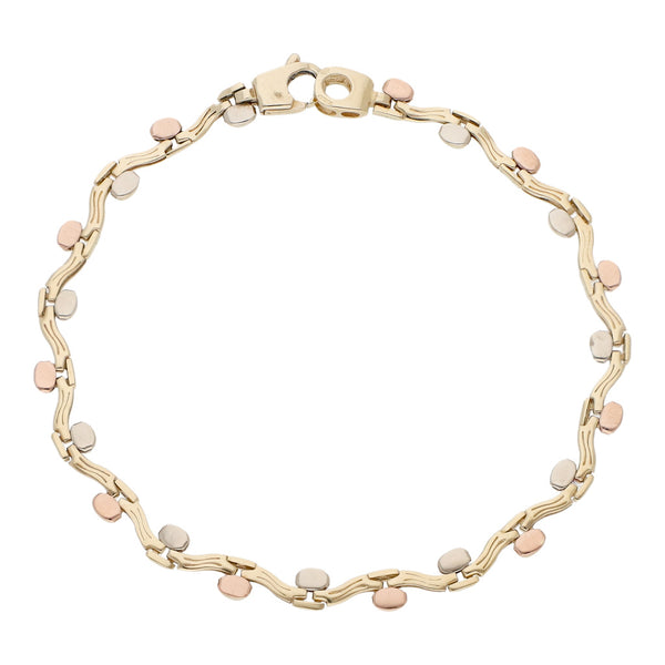 Pulsera eslabón articulado con aplicaciones en oro tres tonos 14 kilates.