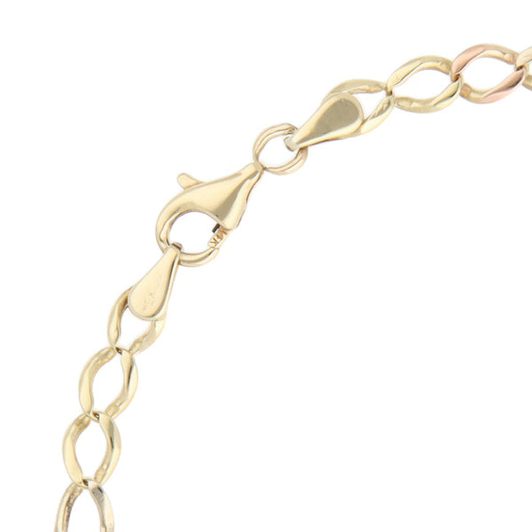 Pulsera de tres eslabones por uno en oro tres tonos 14 kilates.