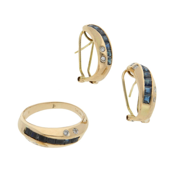 Juego de anillo y aretes estilizados con diamantes y zafiros en oro amarillo 14 kilates.
