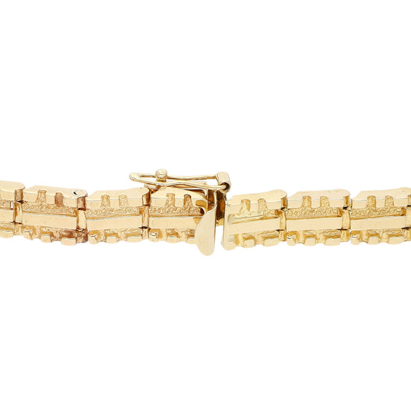 Pulsera eslabón articulado en oro amarillo 14 kilates.