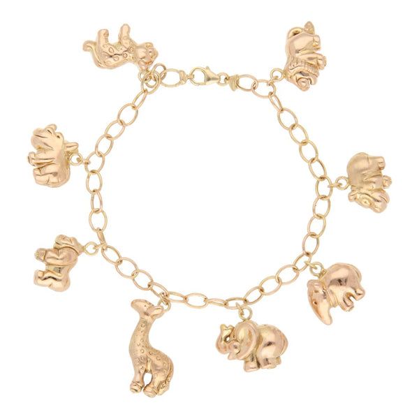 Pulsera eslabón cruzado con colgantes motivo animales en oro rosa 14 kilates.