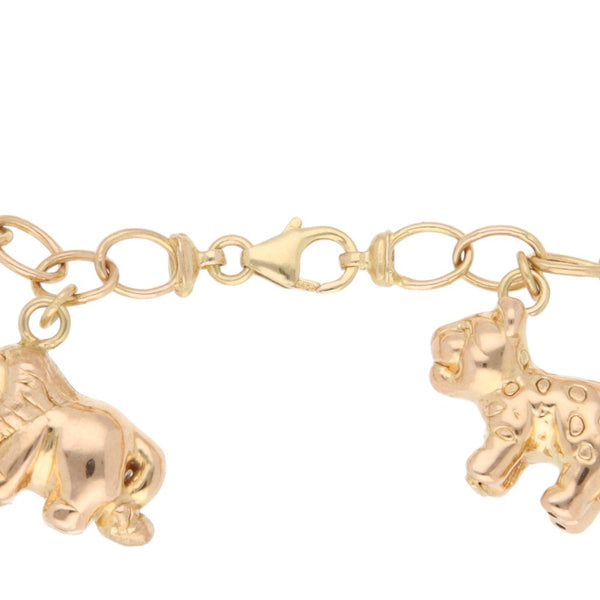Pulsera eslabón cruzado con colgantes motivo animales en oro rosa 14 kilates.
