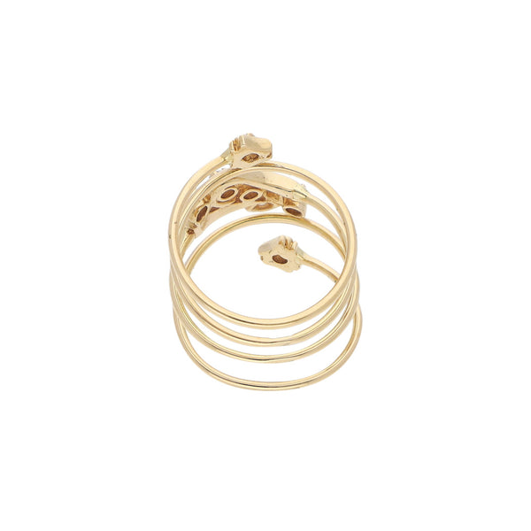 Anillo estilizado con circconias en oro amarillo 14 kilates.
