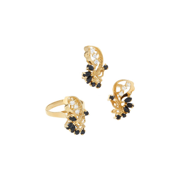 Juego de anillo y aretes diseño especial con zafiros y circonias en oro amarillo 14 kilates.
