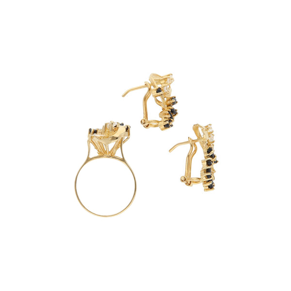 Juego de anillo y aretes diseño especial con zafiros y circonias en oro amarillo 14 kilates.