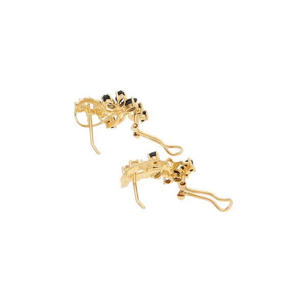 Juego de anillo y aretes diseño especial con zafiros y circonias en oro amarillo 14 kilates.