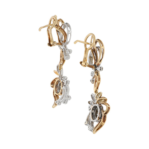 Aretes diseño especia con colgantes y diamantes en oro dos tonos 14 kilates.