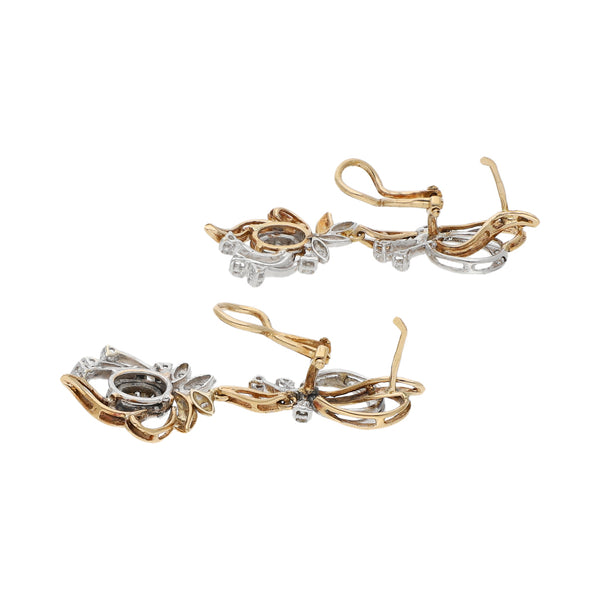 Aretes diseño especia con colgantes y diamantes en oro dos tonos 14 kilates.