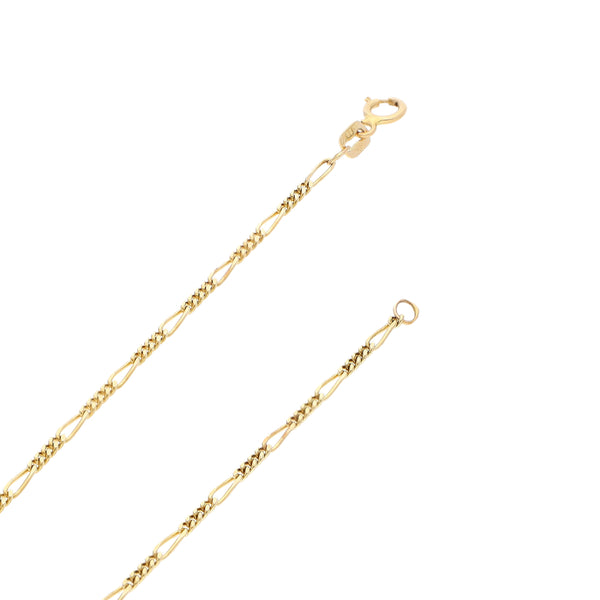 Collar de cuatro eslabones por uno y dije diseño especial motivo llave en oro amarillo 14 kilates.