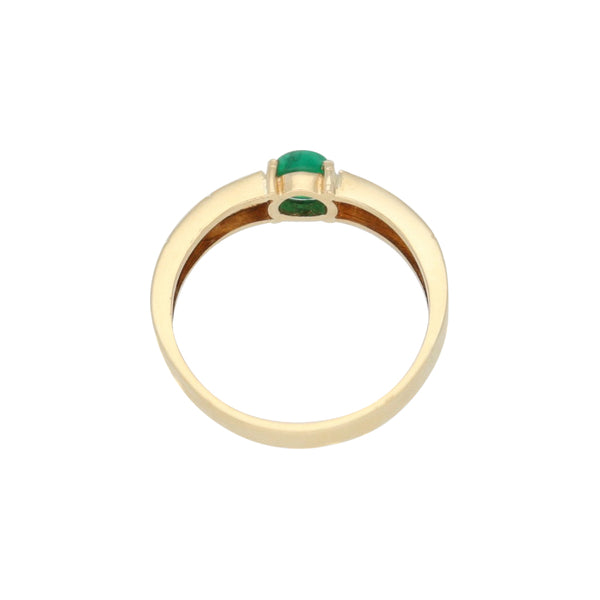 Anillo diseño especial con esmeralda en oro amarillo 18 kilates.
