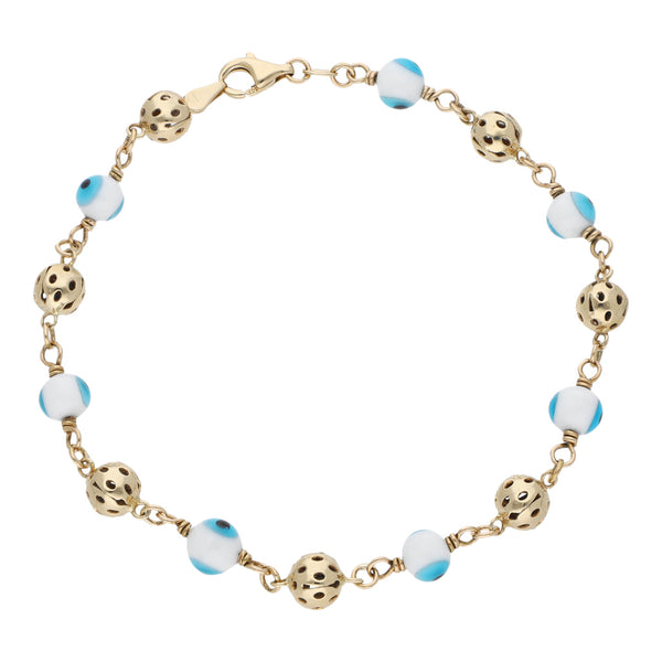 Pulsera eslabón cruzado motivo ojos y esferas con sintéticos en oro amarillo 14 kilates
