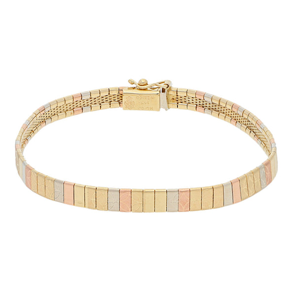 Pulsera eslabón planchado en oro tres tonos 14 kilates.