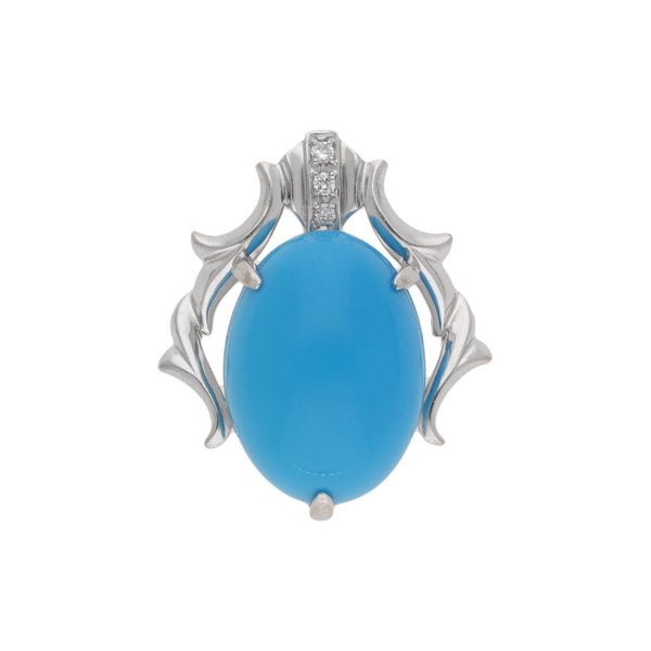 Dije diseño especial con diamantes y turquesa en oro blanco 18 kilates.