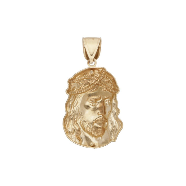 Medalla laminada motivo Divino Rostro en oro amarillo 14 kilates.