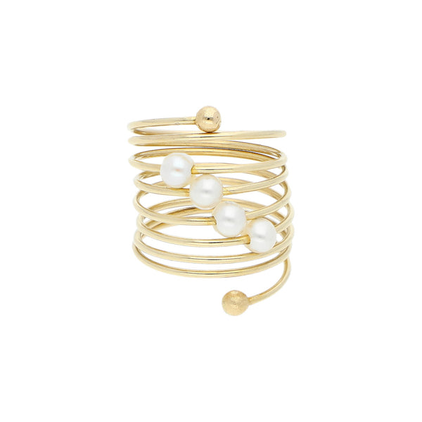 Anillo ondulado con perlas en oro amarillo 14 kilates.