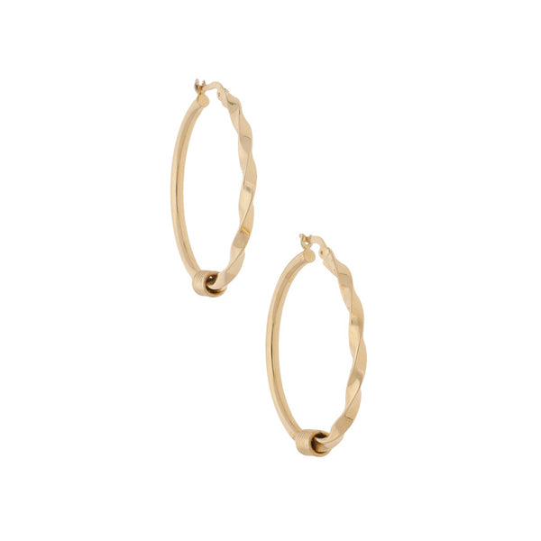 Arracadas huecas en oro amarillo 14 kilates.