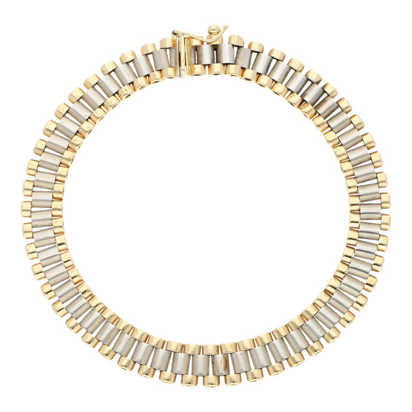 Pulsera eslabón articulado en oro dos tonos 14 kilates.