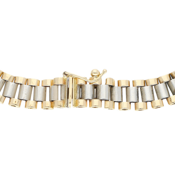 Pulsera eslabón articulado en oro dos tonos 14 kilates.