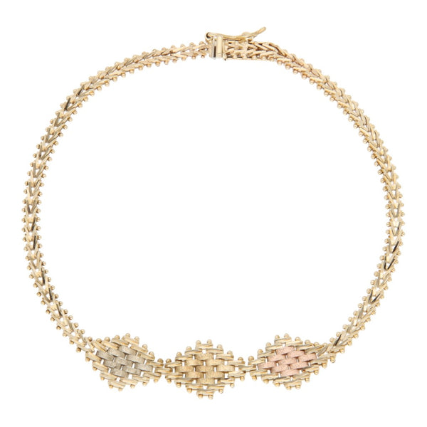Pulsera eslabón boleado en oro tres tonos 14 kilates.