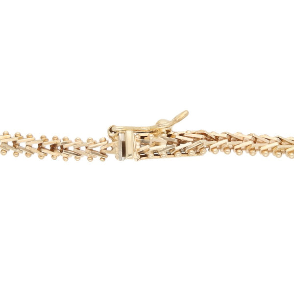 Pulsera eslabón boleado en oro tres tonos 14 kilates.