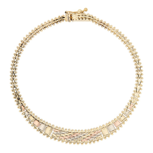 Pulsera eslabón boleado en oro tres tonos 14 kilates.