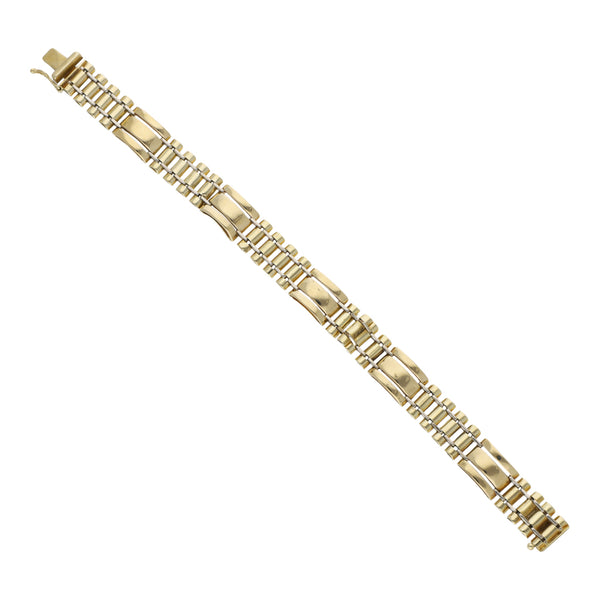 Pulsera eslabón articulado en oro dos tonos 14 kilates.