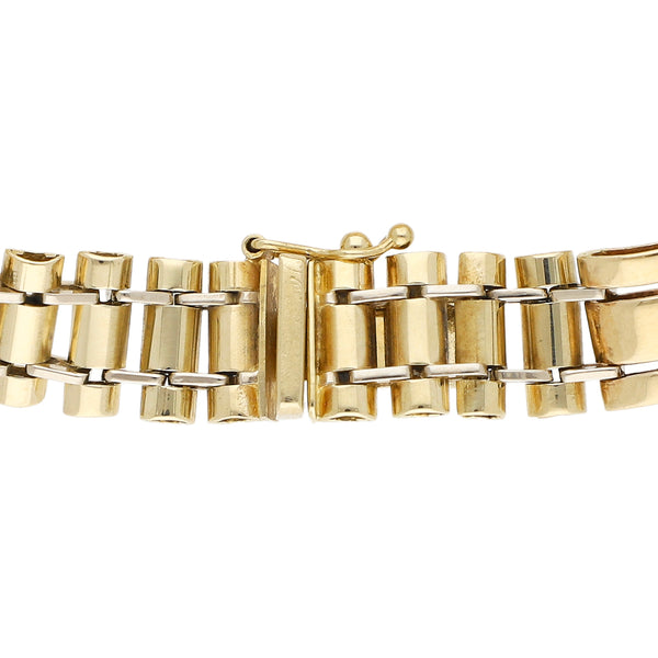 Pulsera eslabón articulado en oro dos tonos 14 kilates.