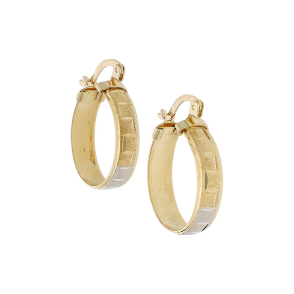 Arracadas labradas en oro amarillo 14 kilates.