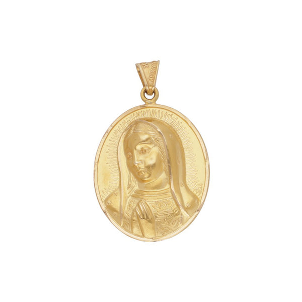 Medalla hueca motivo Virgen de Guadalupe en oro amarillo 18 kilates.