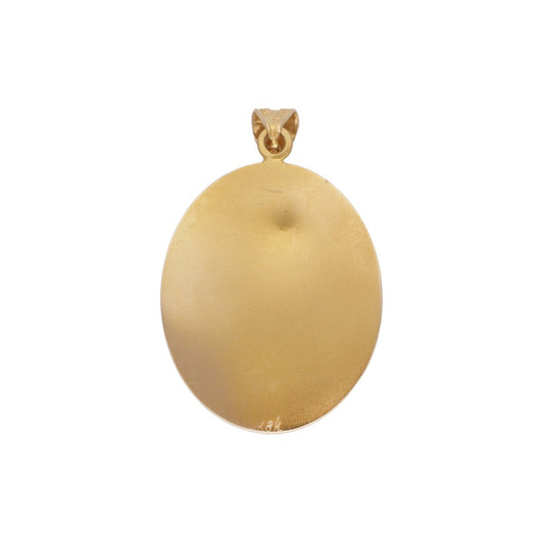 Medalla hueca motivo Virgen de Guadalupe en oro amarillo 18 kilates.