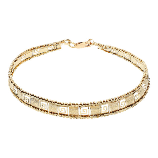 Pulsera eslabón boleado calado motivo grecas en oro amarillo 14 kilates.
