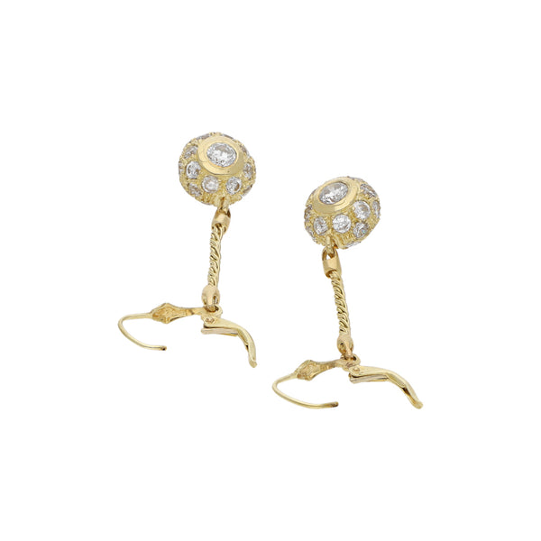 Anillo diseño especial con colgantes y circonias en oro amarillo 14 kilates.