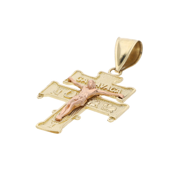 Crucifijo diseño especial en oro dos tonos 14 kilates.