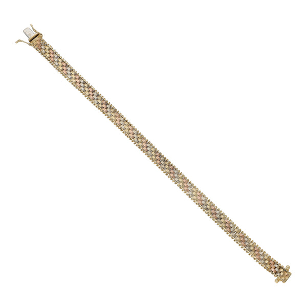 Pulsera eslabón boleado en oro tres tonos 14 kilates.