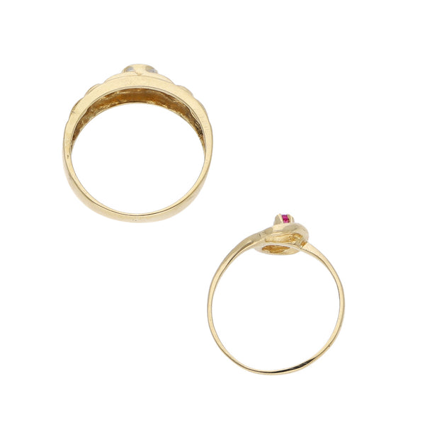 Dos anillos diseño especial con diamante y rubí en oro amarillo 14 kilates.