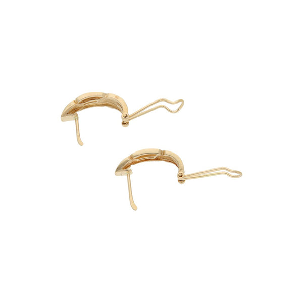 Aretes diseño especial en oro amarillo 14 kilates.