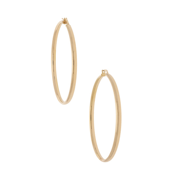 Arracadas lisas en oro amarillo 14 kilates.
