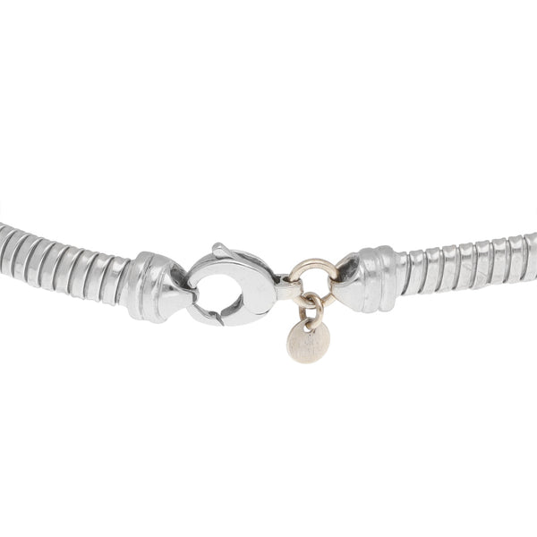 Pulsera eslabón hueco en oro blanco 14 kilates.