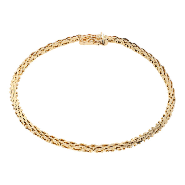 Pulsera eslabón boleado en oro amarillo 14 kilates.
